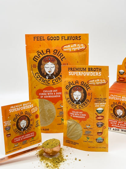 Group shot of all 3 sizes of Cosmic Curry packaging, single serve packet, 8 and 36 serving bags